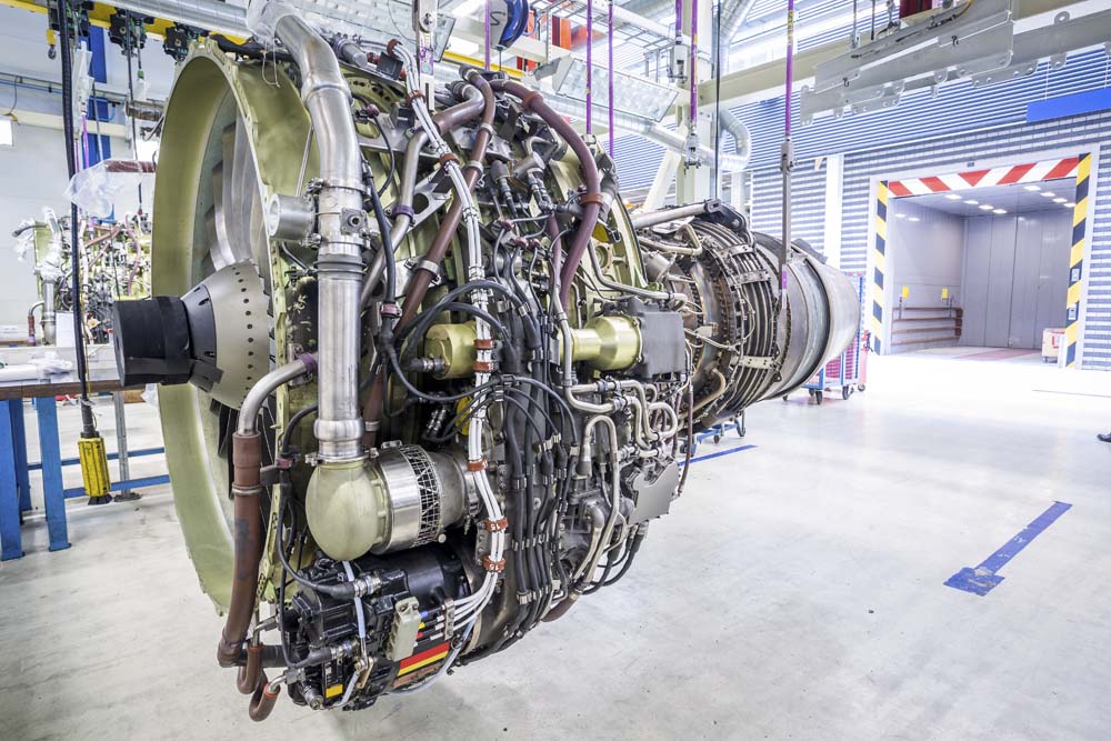 An airplane engine during maintenance in a warehouse